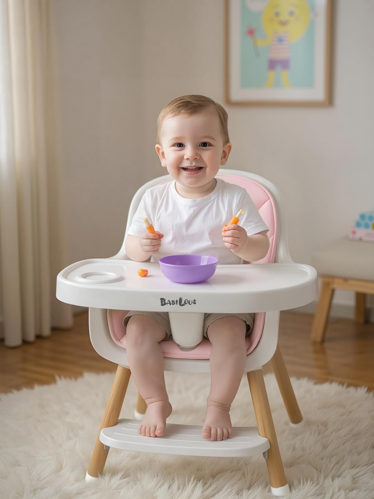 Babilous pink high chair adds cheerful color while supporting early dining independence.