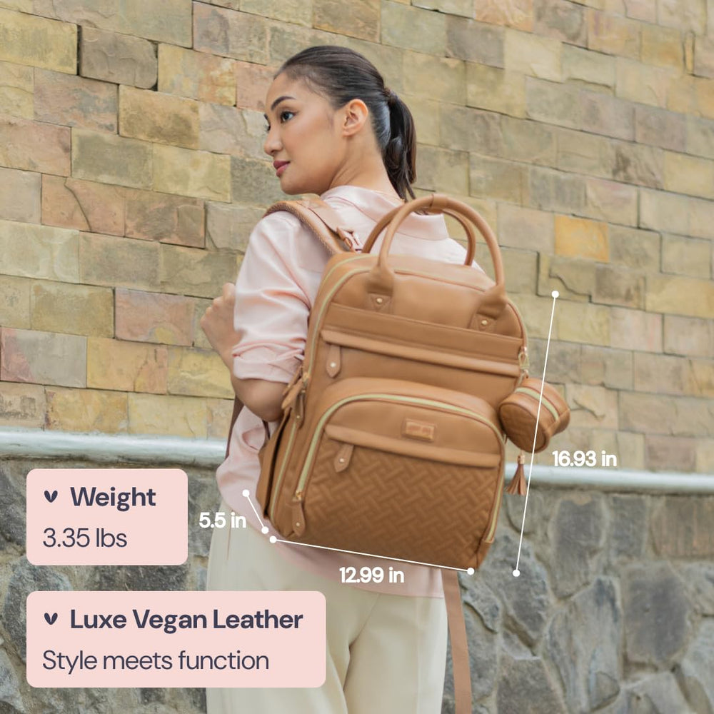 BabbleRoo leather diaper bag changing pad pocket enables easy on-the-go changes.