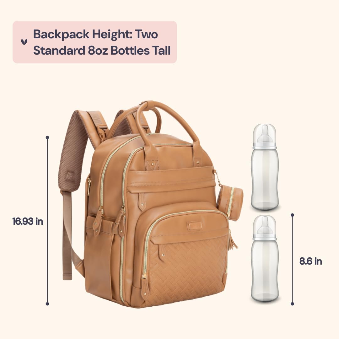 BabbleRoo leather diaper bag backpack interior reveals multiple pockets for baby essentials.