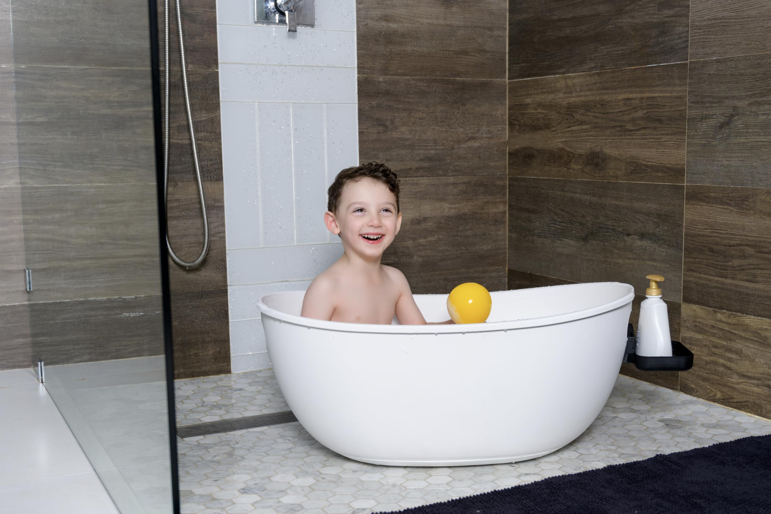 Babu Bath quick-drain hose system enables easy water removal after bath