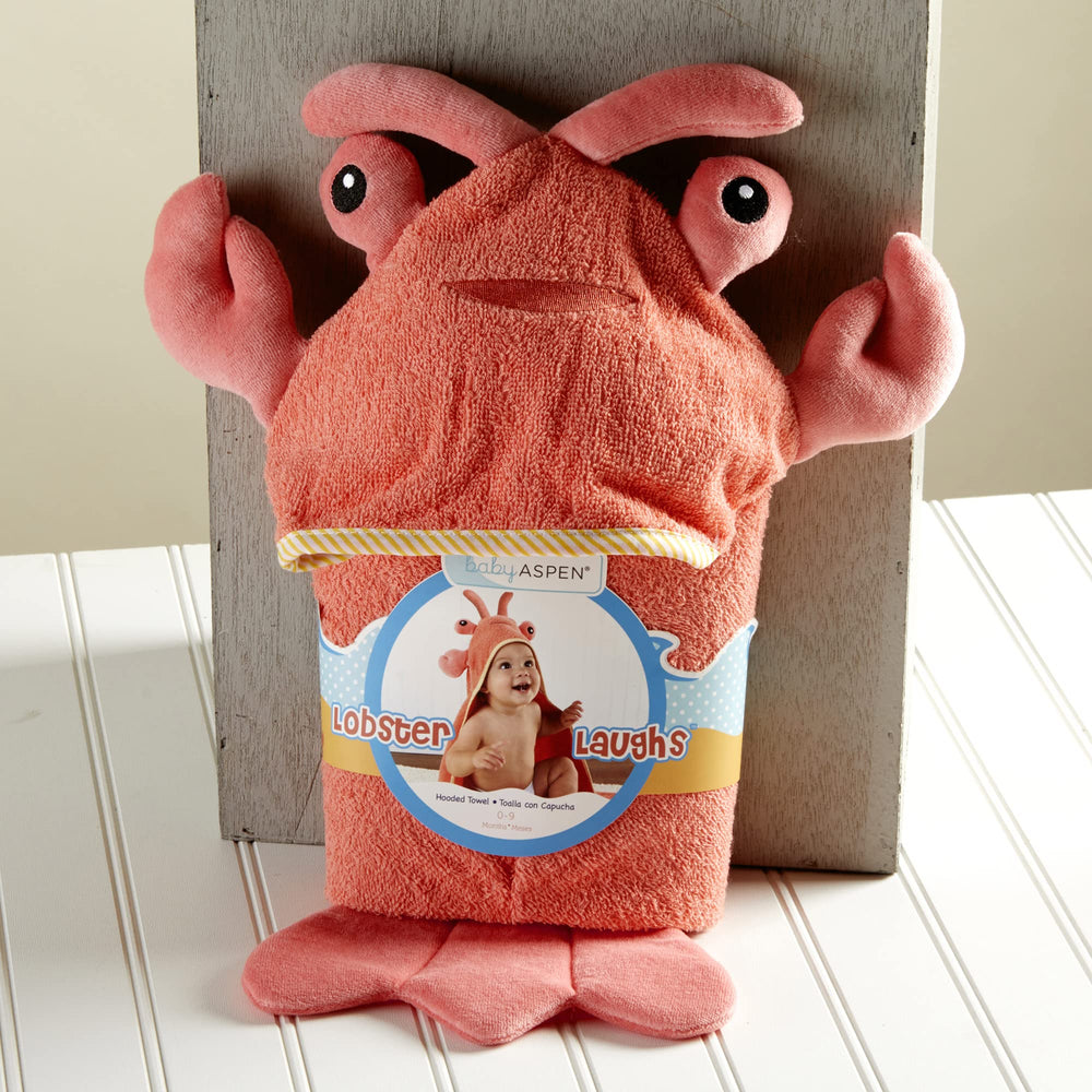 Baby Aspen Lobster Laughs hooded towel in use demonstrates quick post-bath wrap.