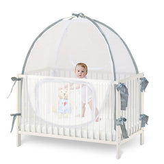 Baby & Beyond crib tent under-mattress fit demonstrates secure installation