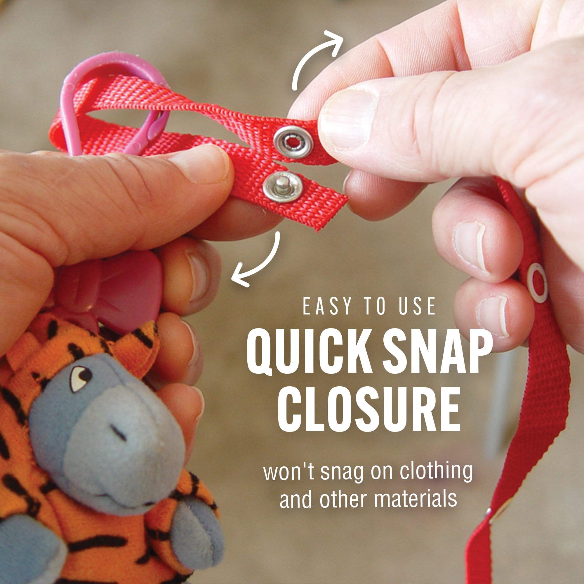 Baby Buddy Secure-A-Toy pacifier secured to high chair for easy access.