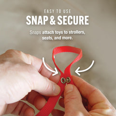 Baby Buddy Secure-A-Toy teether secured to stroller for on-the-go soothing.