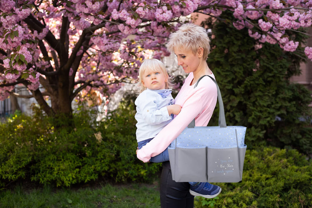 Baby Essentials diaper bag tote fully lined interior to contain spills and simplify cleaning.