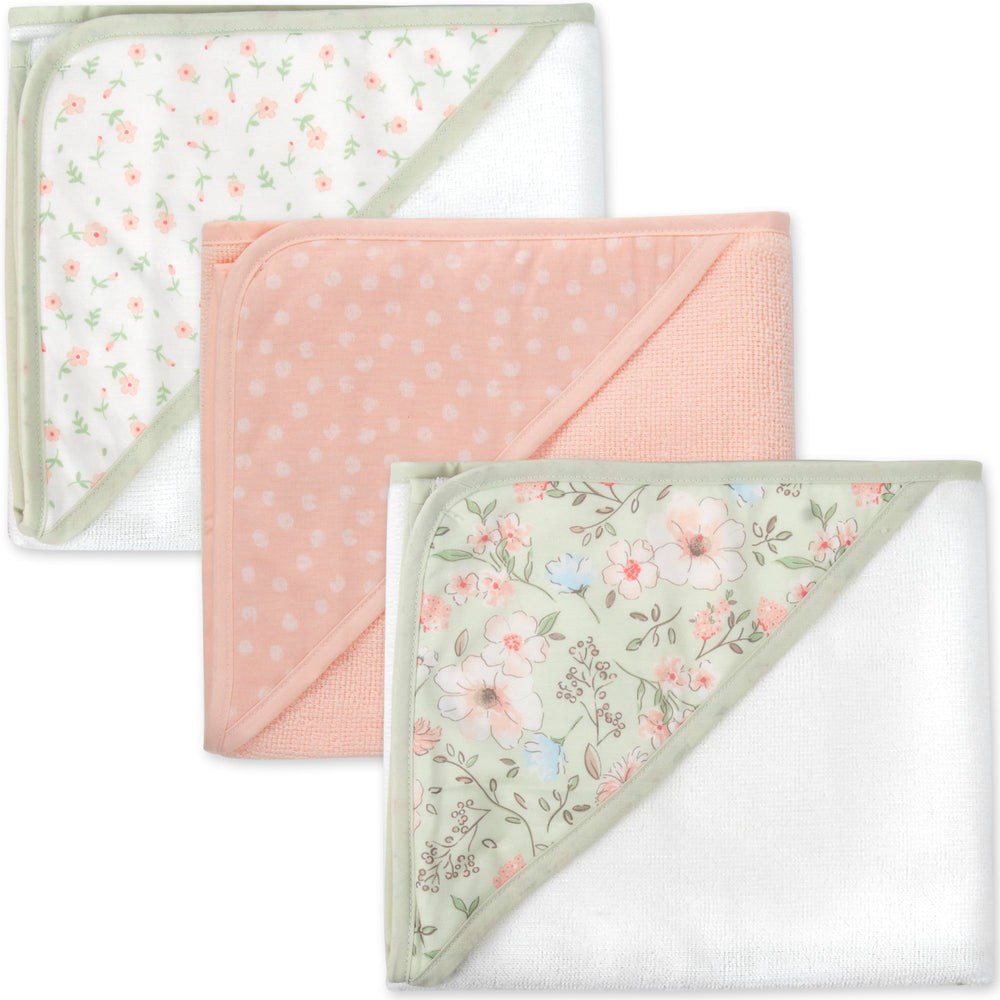 Baby Essentials hooded towel on a baby during bath shows gentle warmth