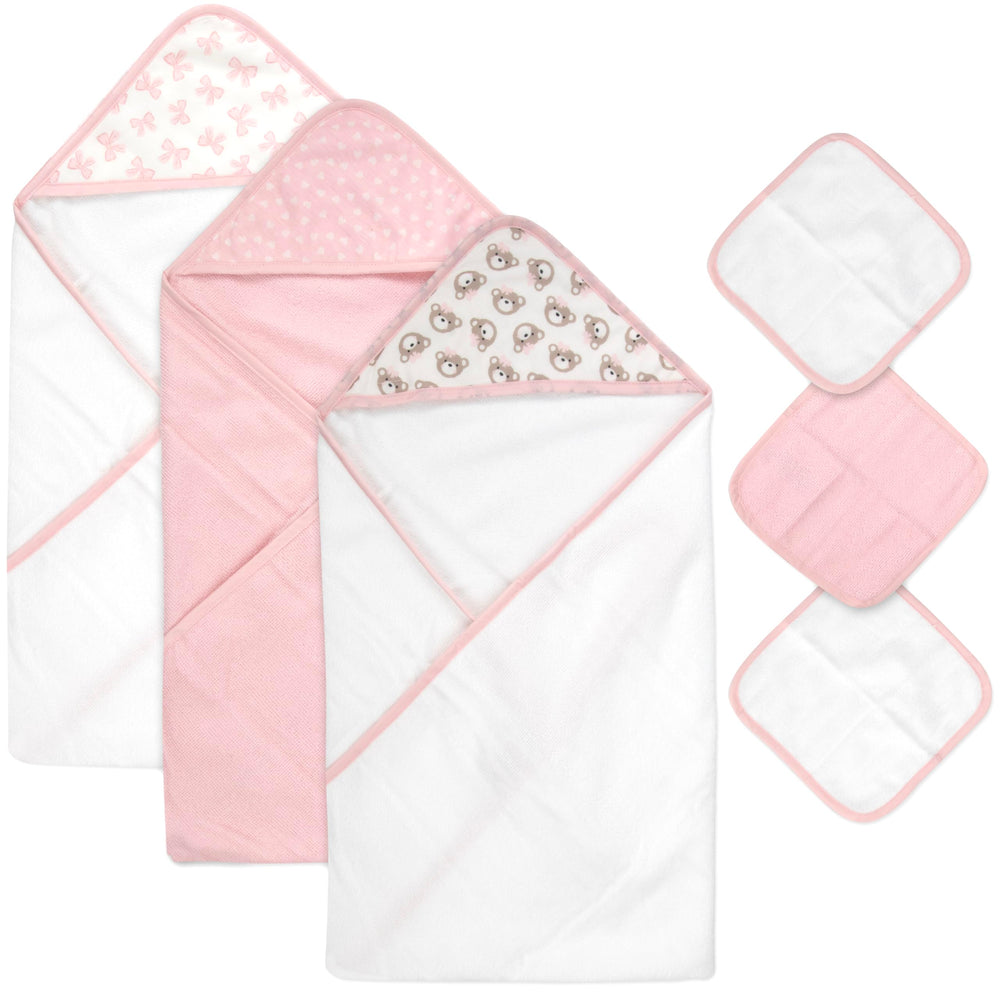 Baby Essentials hooded towel by the pool for quick drying and sun protection