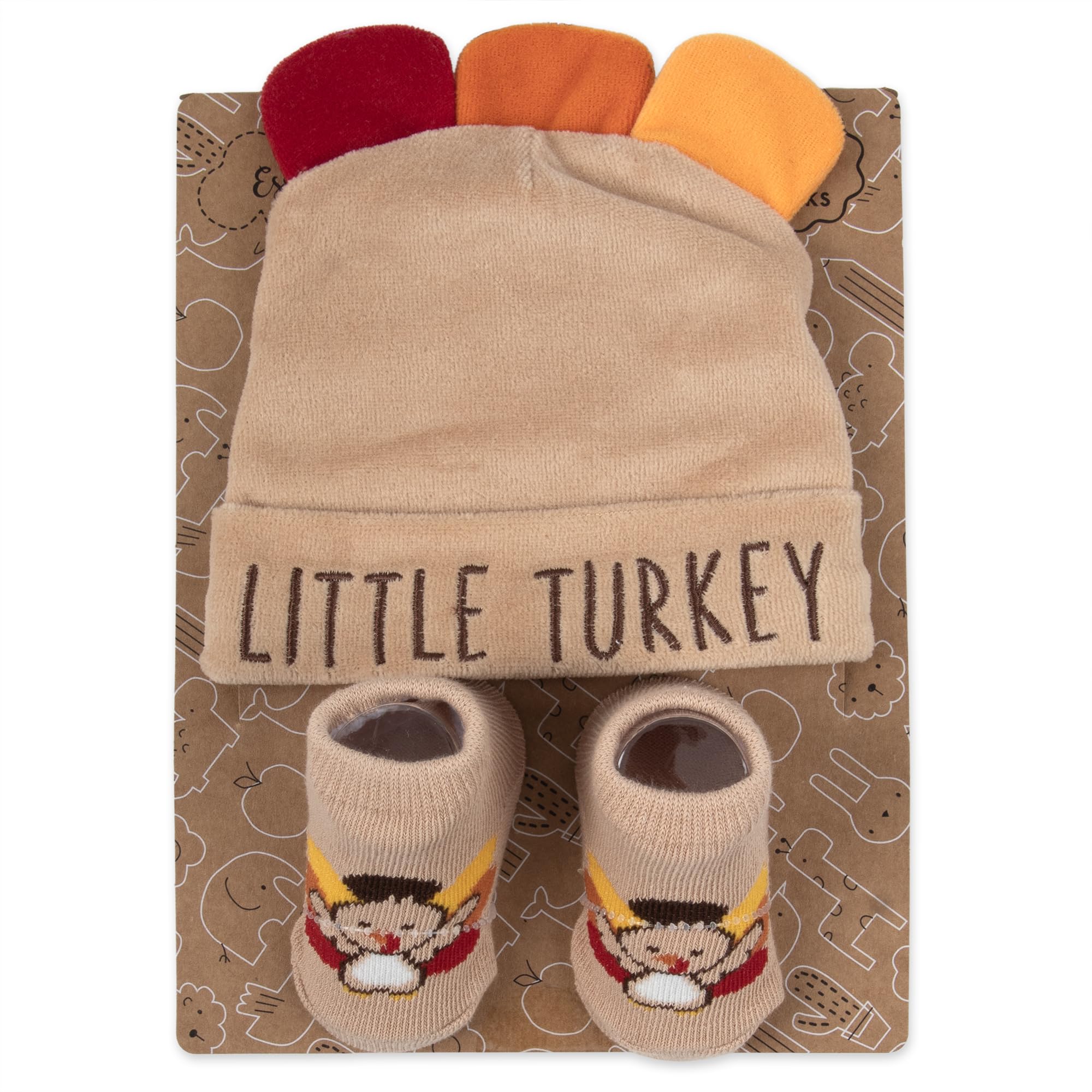 Baby Essentials My First Christmas socks keep tiny feet warm during photo sessions.