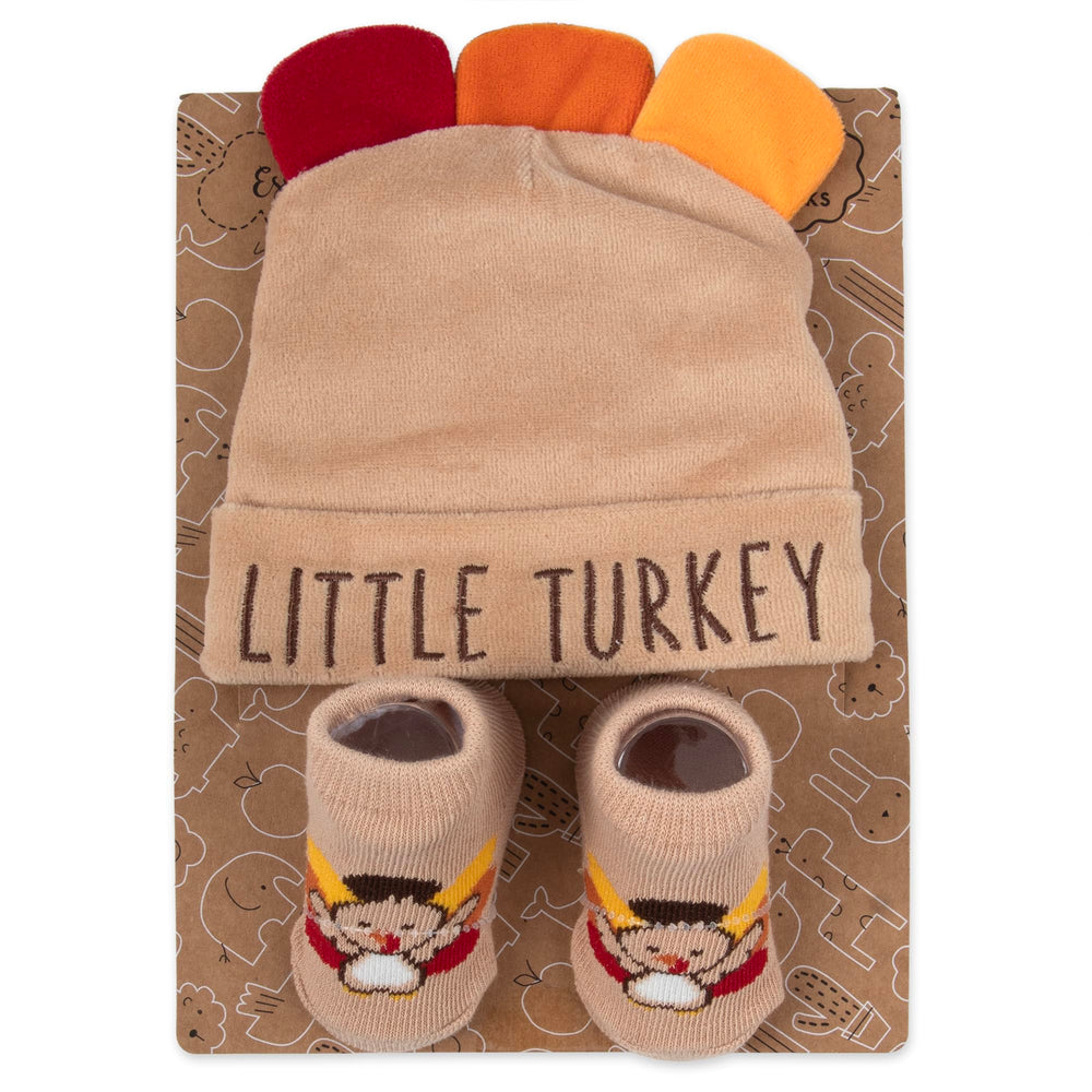 Baby Essentials My First Christmas socks keep tiny feet warm during photo sessions.