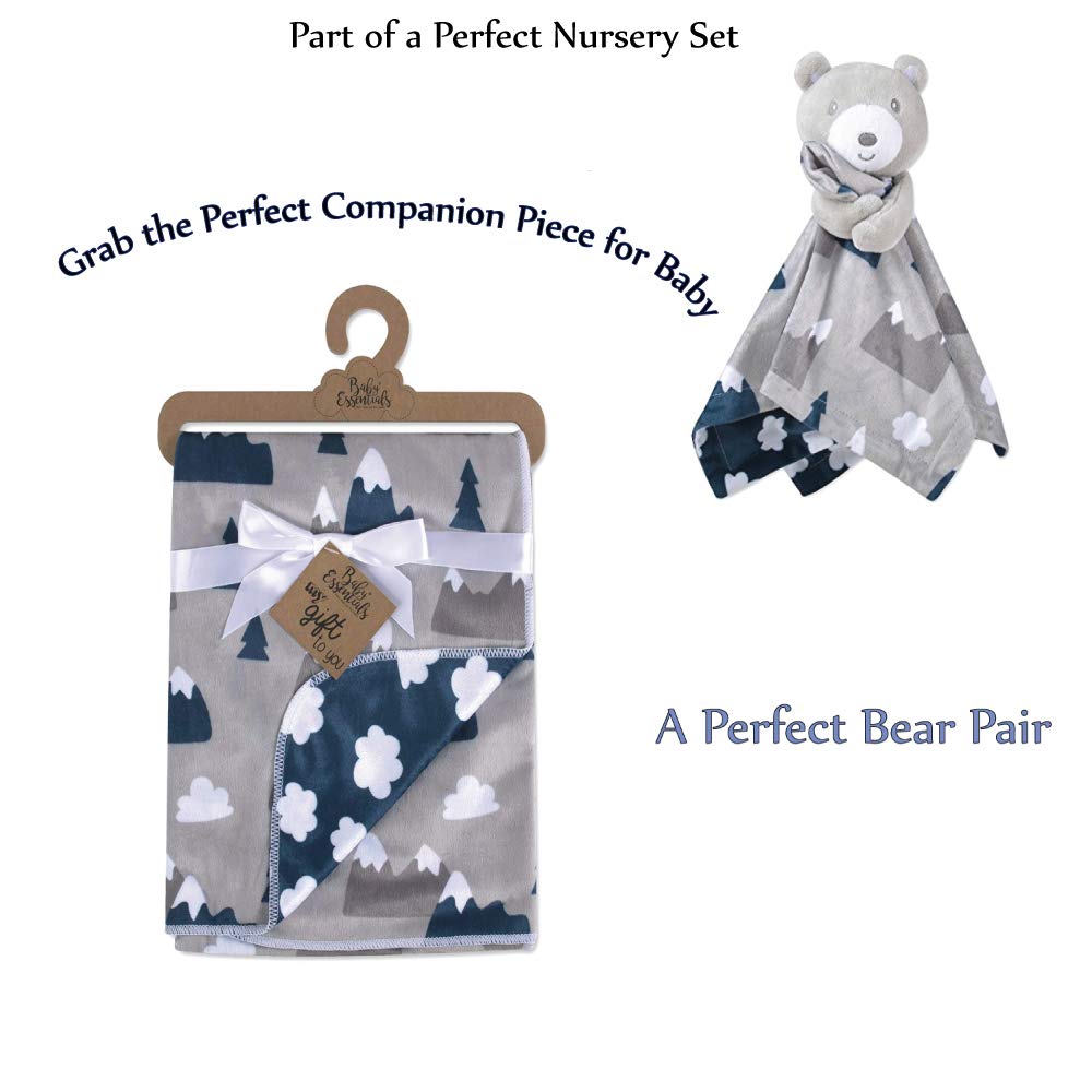 Baby Essentials reversible blanket cloud side offers flexible styling for two looks.
