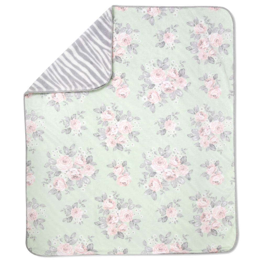 Baby Essentials sherpa blanket in nursery decor adds soft texture and warmth.