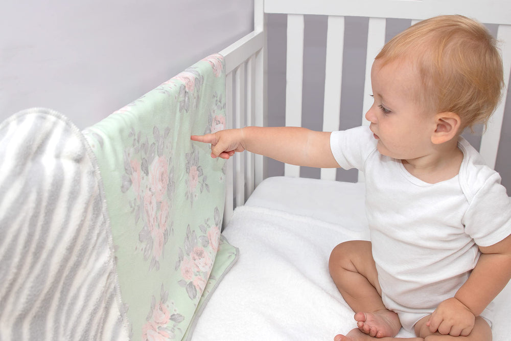 Baby Essentials sherpa blanket used in stroller for lightweight warmth.