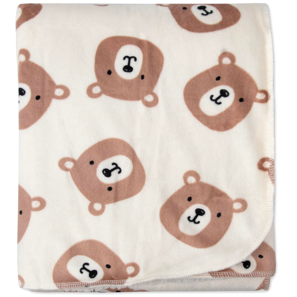 Baby Essentials Sherpa fleece blanket texture is soft and plush for cozy naps.