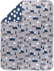 Baby Essentials snowcap mountain pattern highlights a playful nursery accent.