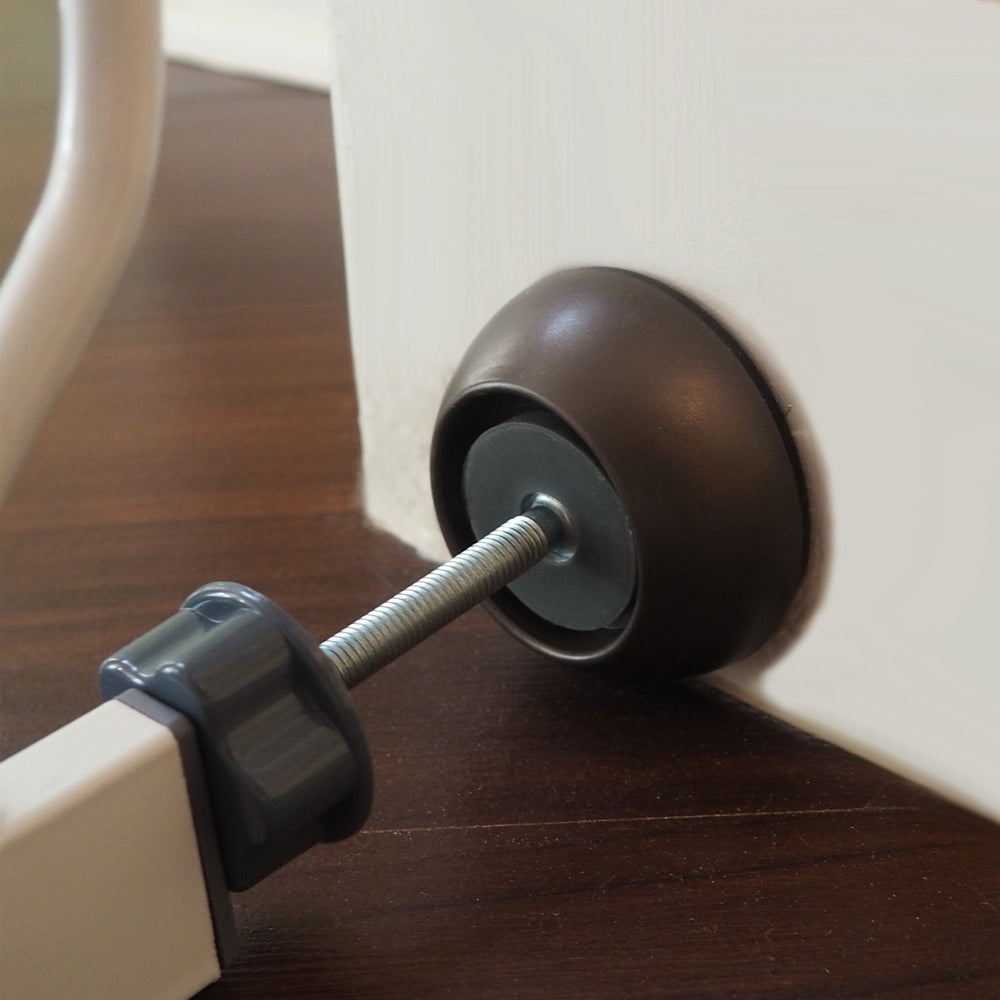 Baby Gate Guru bronze wall protector with non-slip pad reduces movement