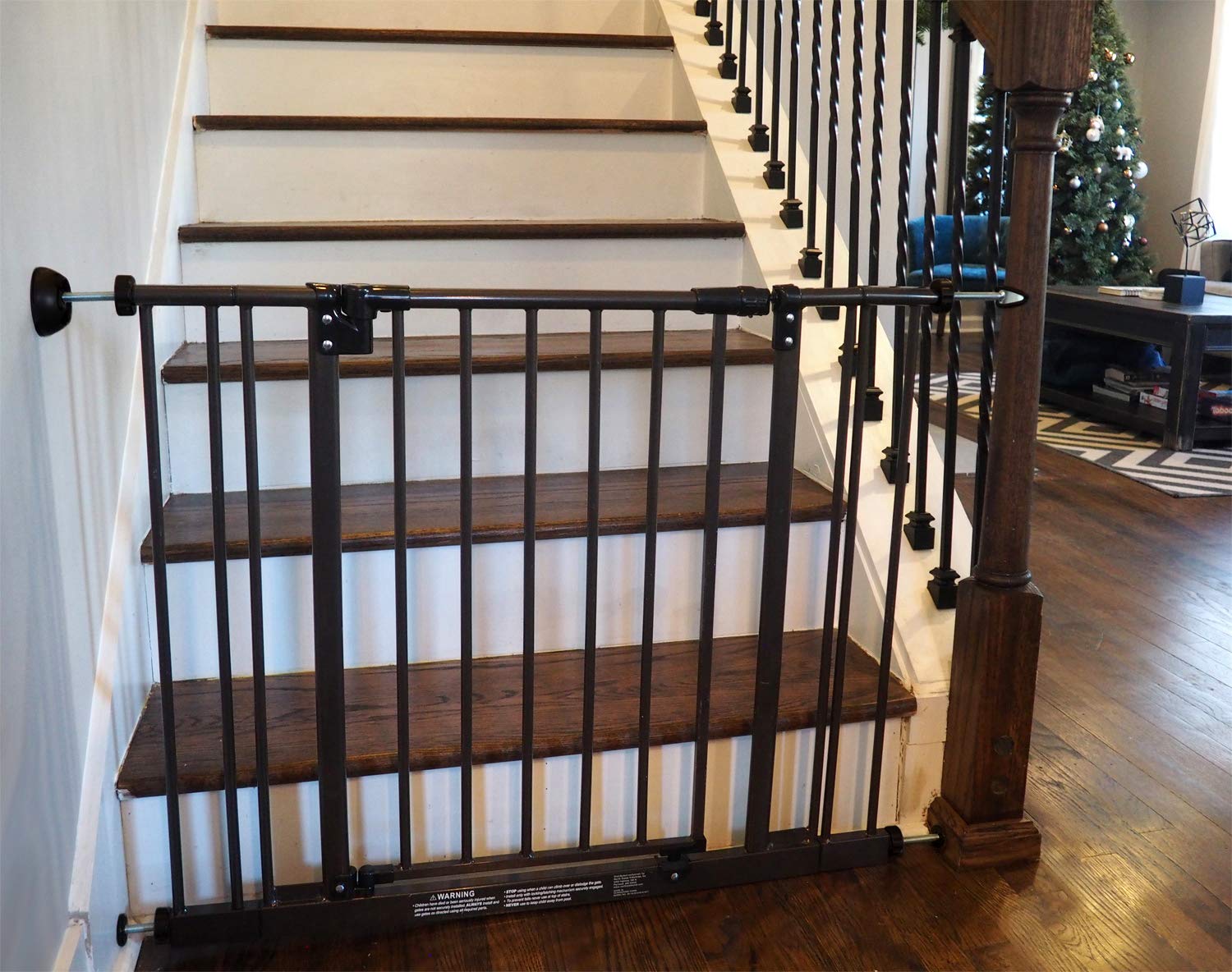 Baby Gate Guru wall protector includes optional middle-hole for permanent attachment.