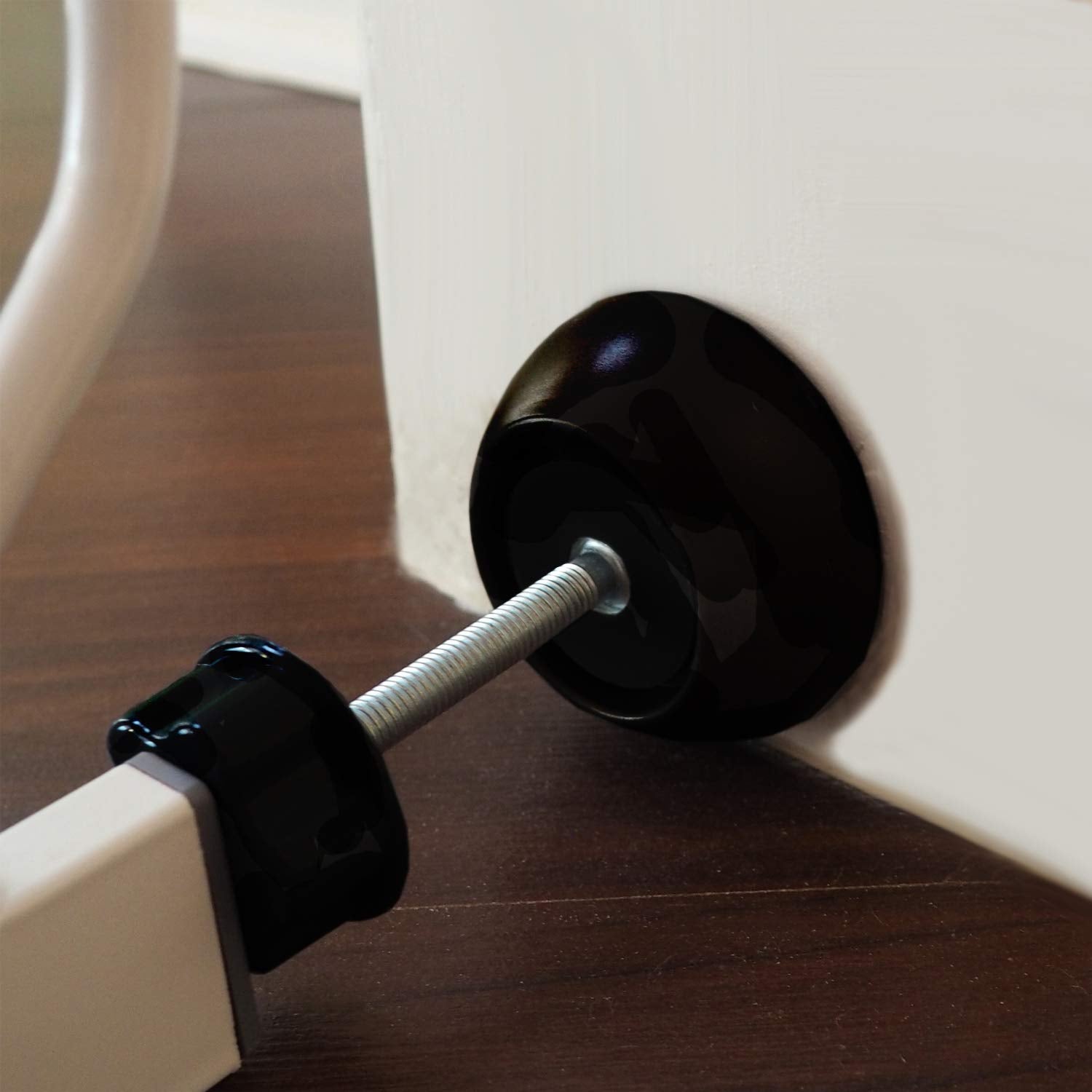Baby Gate Guru no-tools required installation shown with pressure-mounted gate and rubber backing.