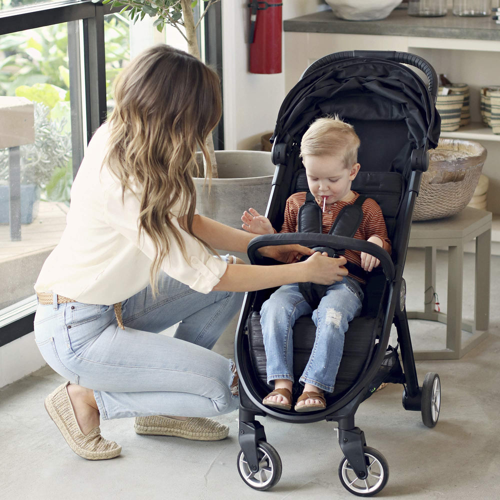 Soft-padded grip on Baby Jogger Belly Bar provides comfortable hold for little hands