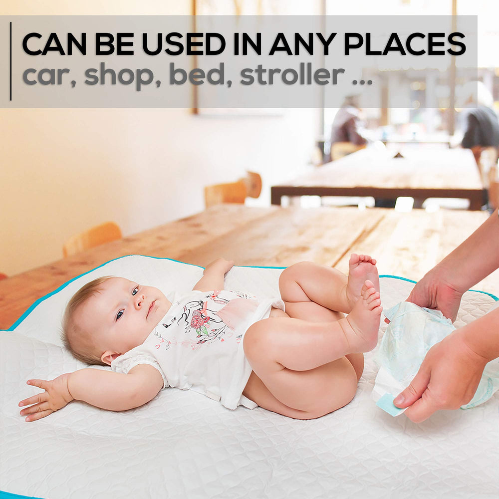 BABY LOOVI mat with storage bag keeps diapers and wipes organized.
