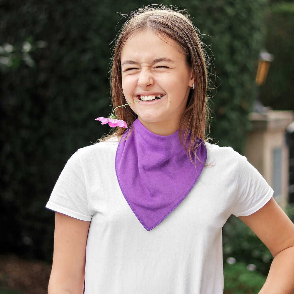 Baby Noah gender-neutral bibs in plain colors suitable for any gender.