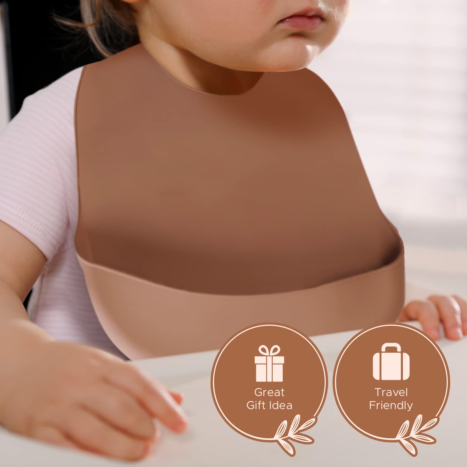 Baby Pick adjustable silicone bib with secure button closure prevents tugging and keeps bib in place.