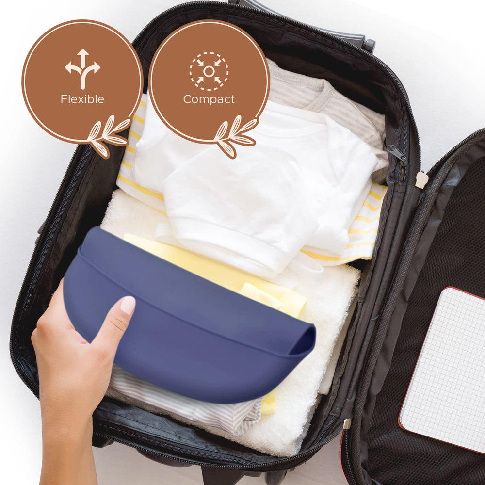 Baby Pick roll-up silicone bib fits in a diaper bag for mess-free travel.