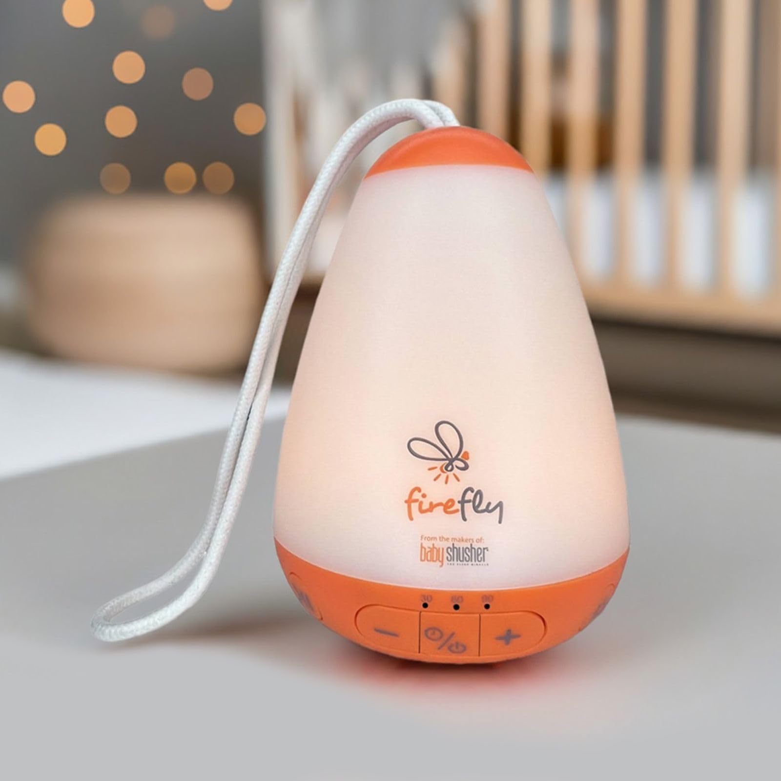 Baby Shusher Firefly carabiner attachment secures to crib or stroller.