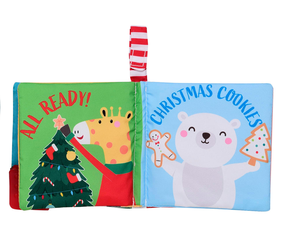 Baby Starters My First Christmas soft activity book in hand demonstrates portable learning during car rides