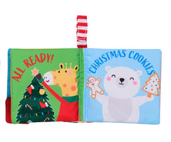 Baby Starters My First Christmas soft activity book in hand demonstrates portable learning during car rides