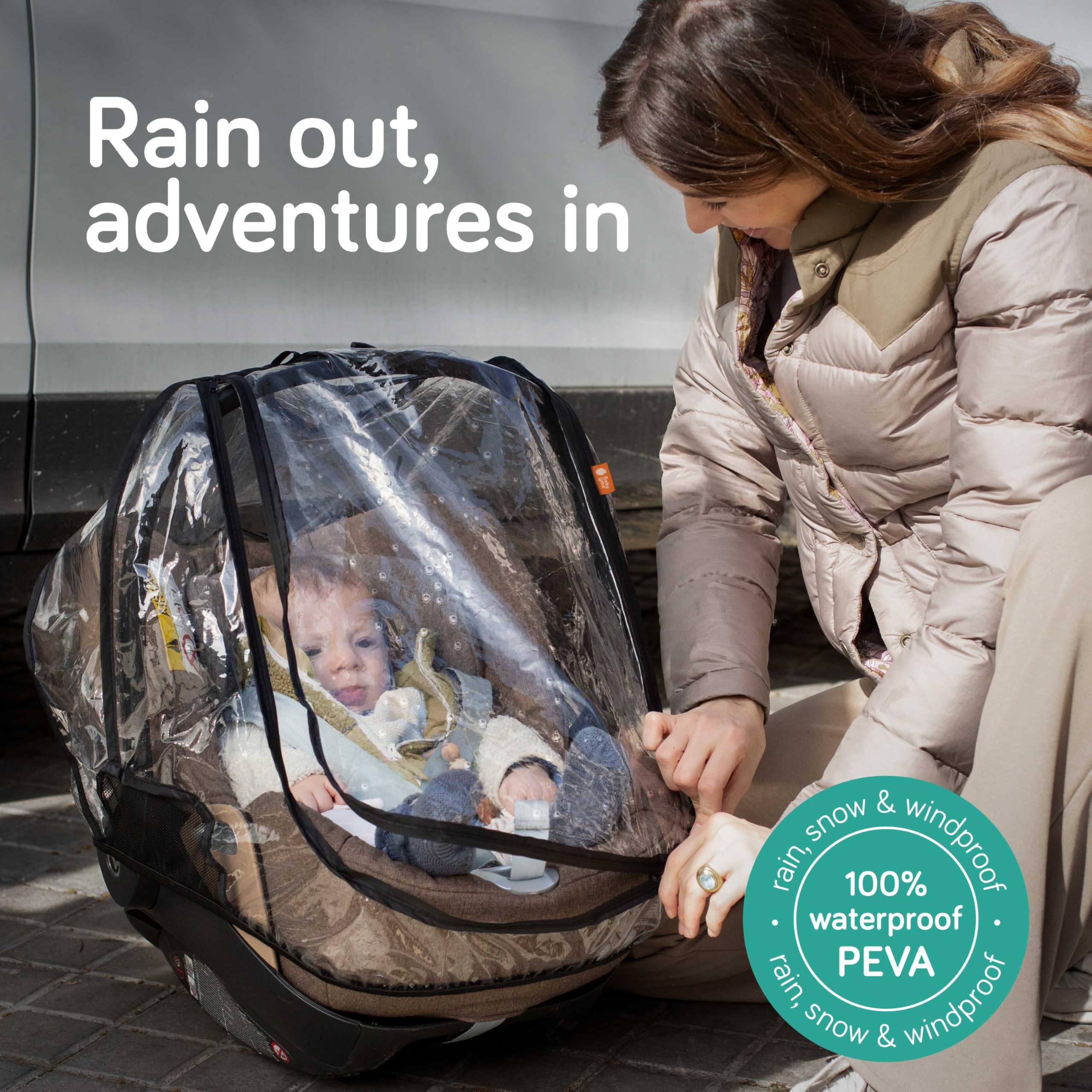 Baby Uma rain cover shows ventilation panels for airflow.