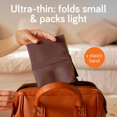 Baby Uma non-toxic lead-free material supports safe diaper changes.