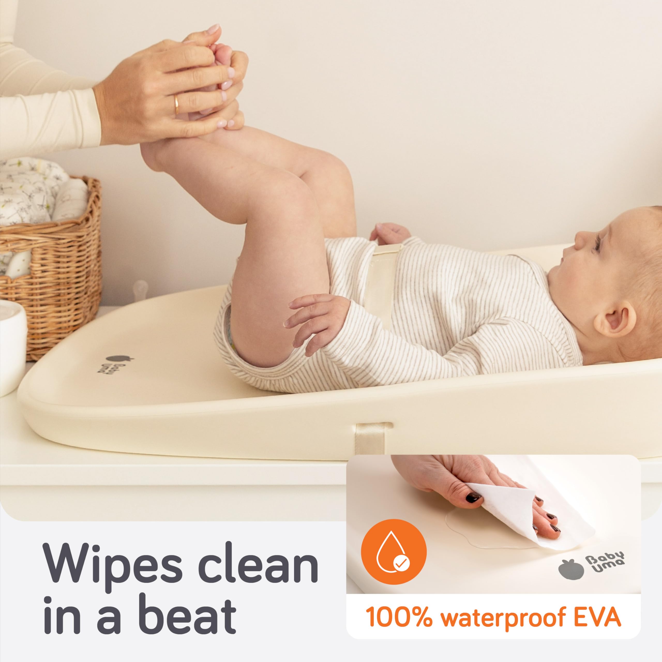 Baby Uma pad with quick-release buckle enables safe, wiggle-free diaper changes