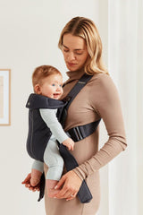 BabyBjörn Baby Carrier Mini 3D mesh close-up emphasizes breathable, lightweight fabric.