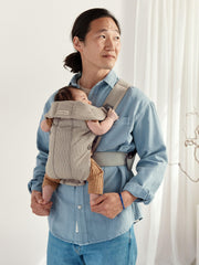 BabyBjörn Mini gray-beige head support for proper neck alignment