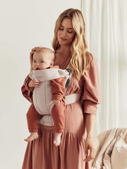 BabyBjörn Baby Carrier Mini side view in 3D jersey shows ergonomic support on the go.