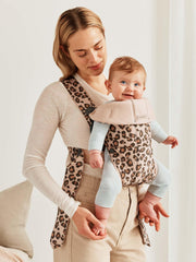 BabyBjörn Baby Carrier Mini side view highlights compact, portable profile