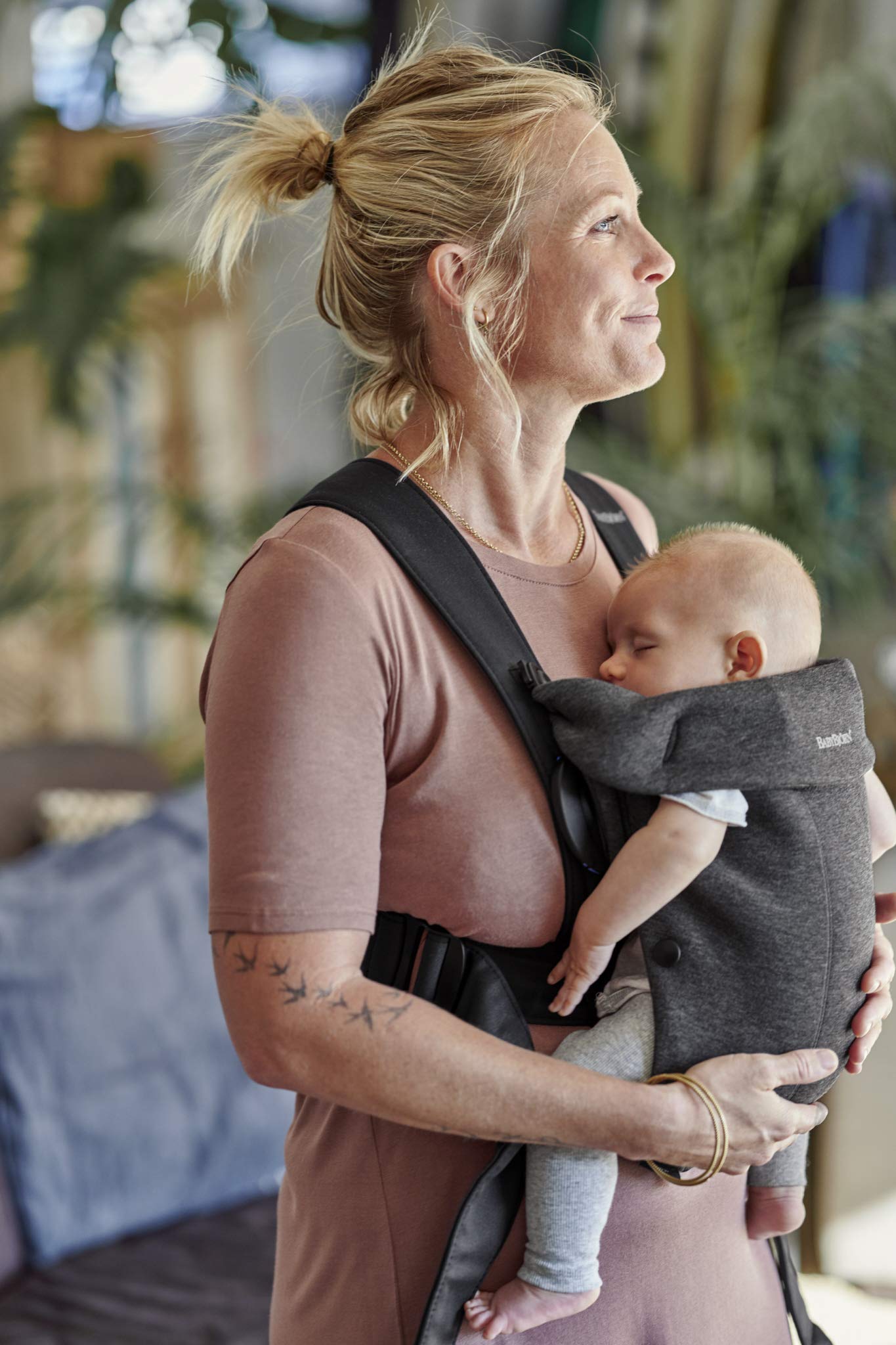 BabyBjörn Baby Carrier Mini fabric options offer soft comfort for baby skin.