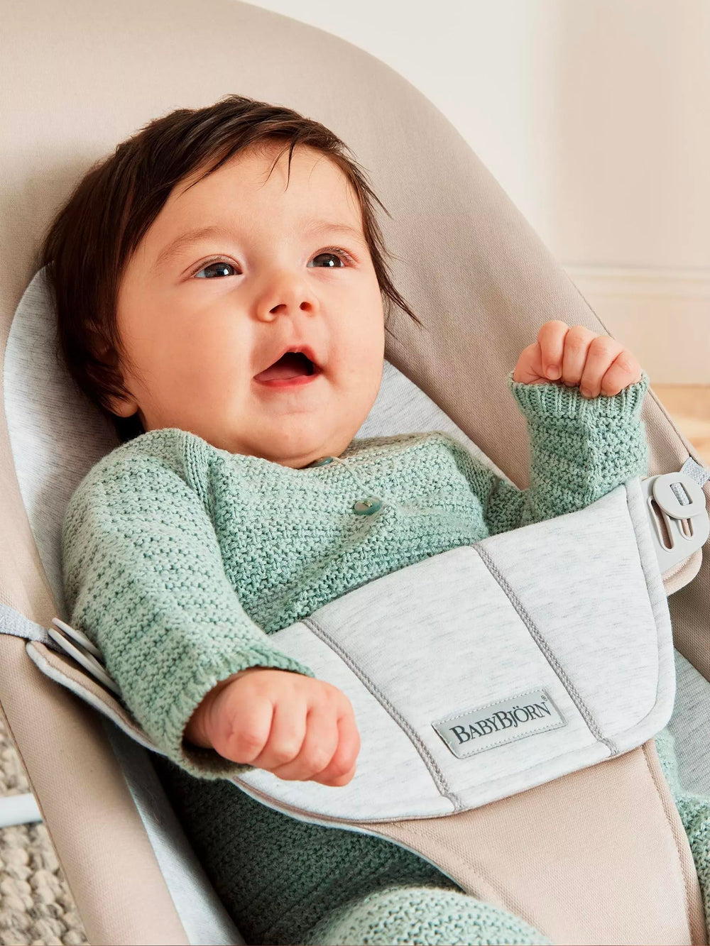 BabyBjörn Bouncer Balance Soft beige-gray fabric complements nursery decor.