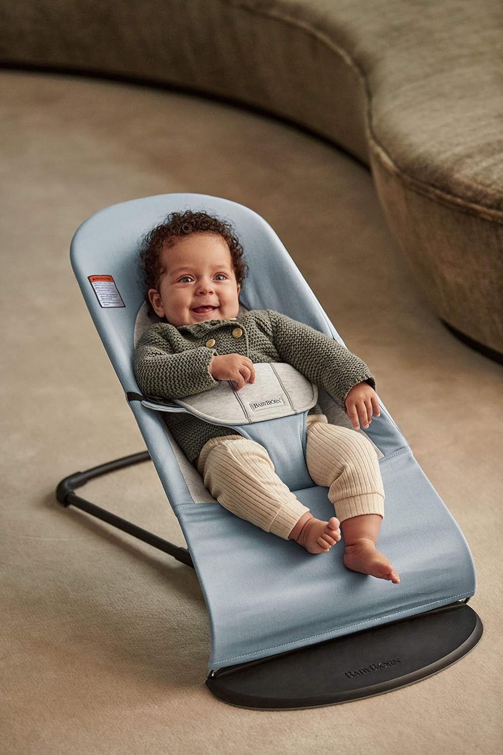 BabyBjörn Bouncer Balance Soft blue-gray newborn-to-toddler use highlights back and neck support.