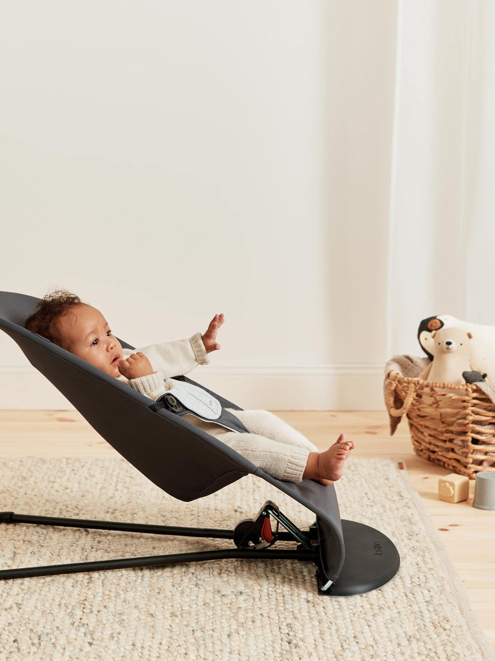 BabyBjörn Bouncer Balance Soft dark gray fabric presents a soothing nursery-friendly look