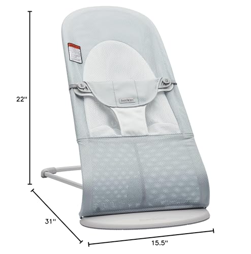 BabyBjörn Bouncer Balance Soft mesh silver/white folded for portable storage.