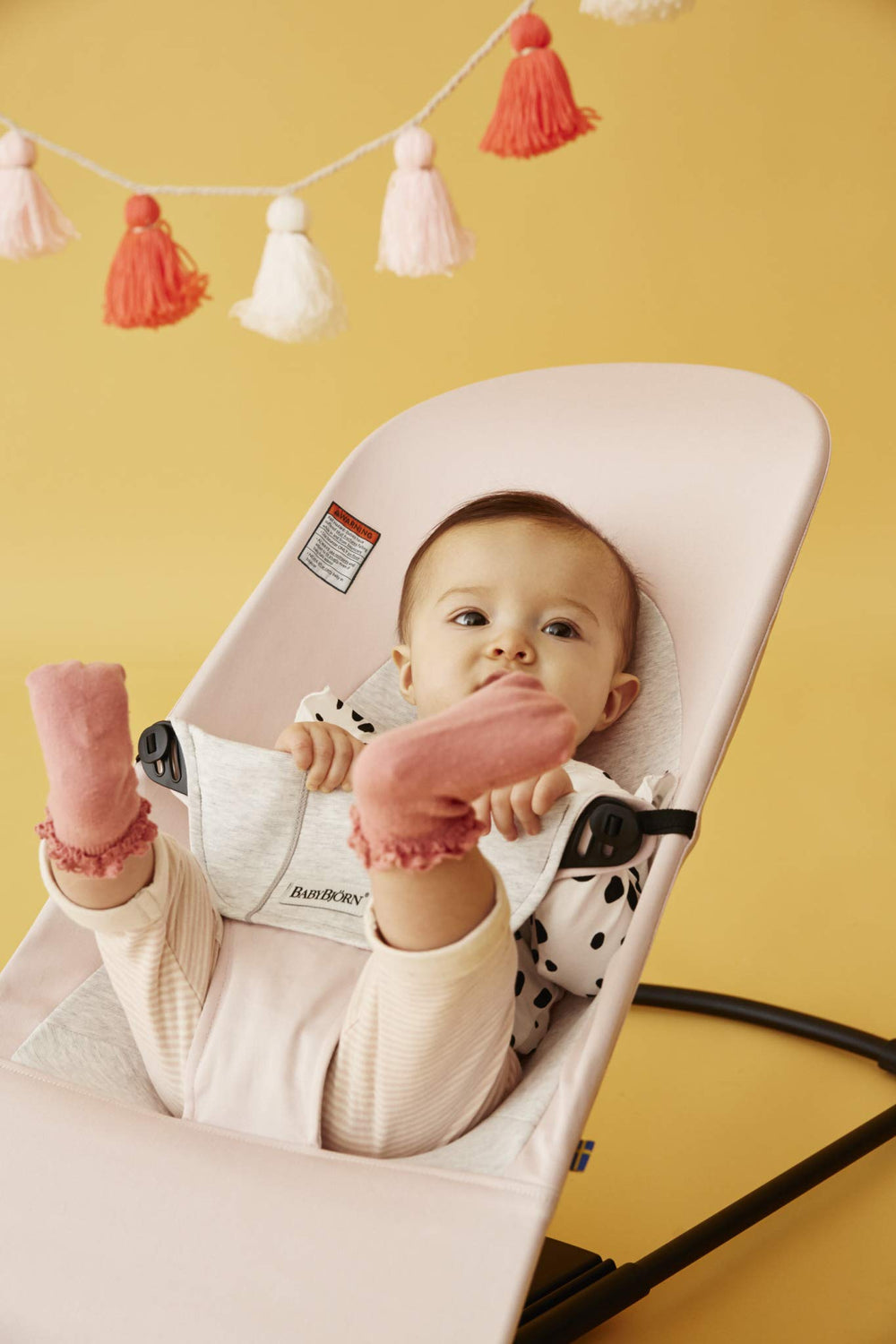 BabyBjörn Bouncer Balance Soft close-up seat fabric shows snug newborn comfort.