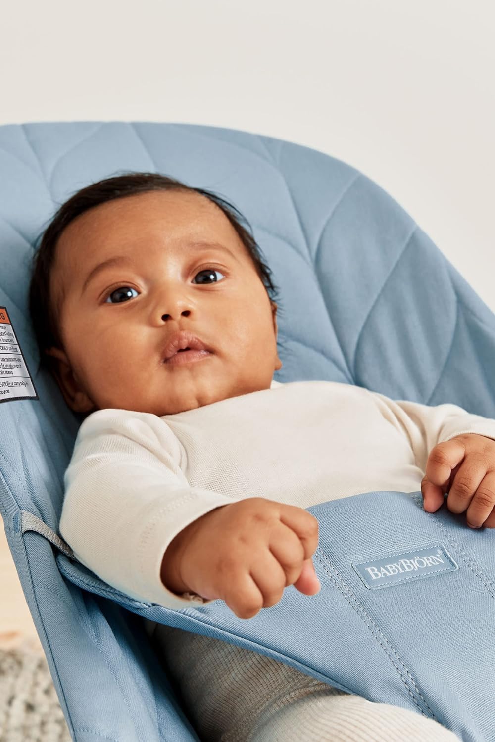 BabyBjörn Bouncer Bliss blue woven harness closeup for secure bouncing