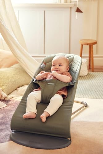 BabyBjörn Bouncer Bliss dark green woven fabric close-up showing texture and comfort.