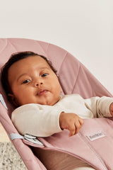 BabyBjörn Bouncer Bliss dusty pink seat converted to chair supports growing child.