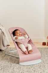 BabyBjörn Bouncer Bliss dusty pink harness demonstrates secure support during use.