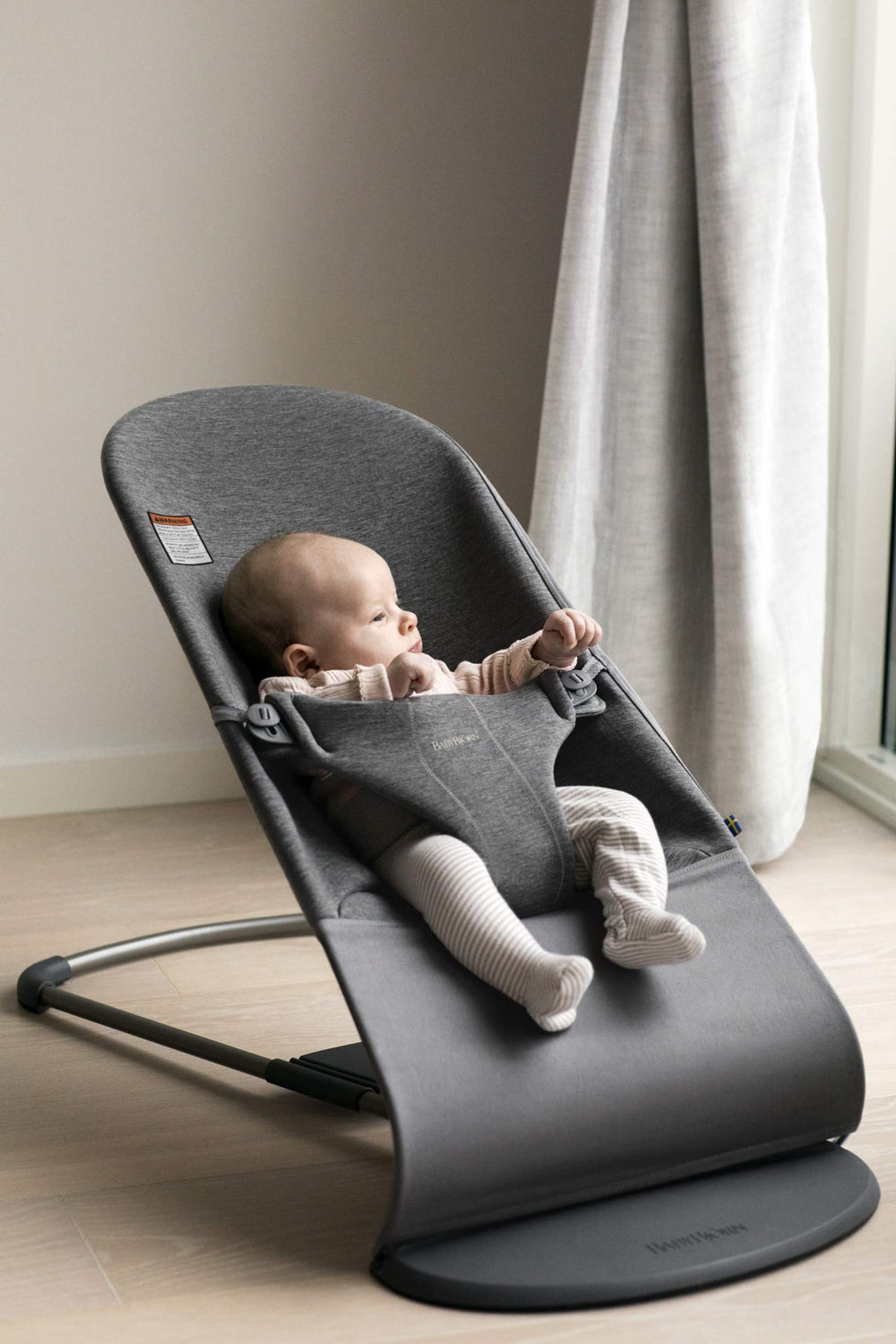 BabyBjorn Bouncer Bliss rocking action invites natural movement and curiosity.
