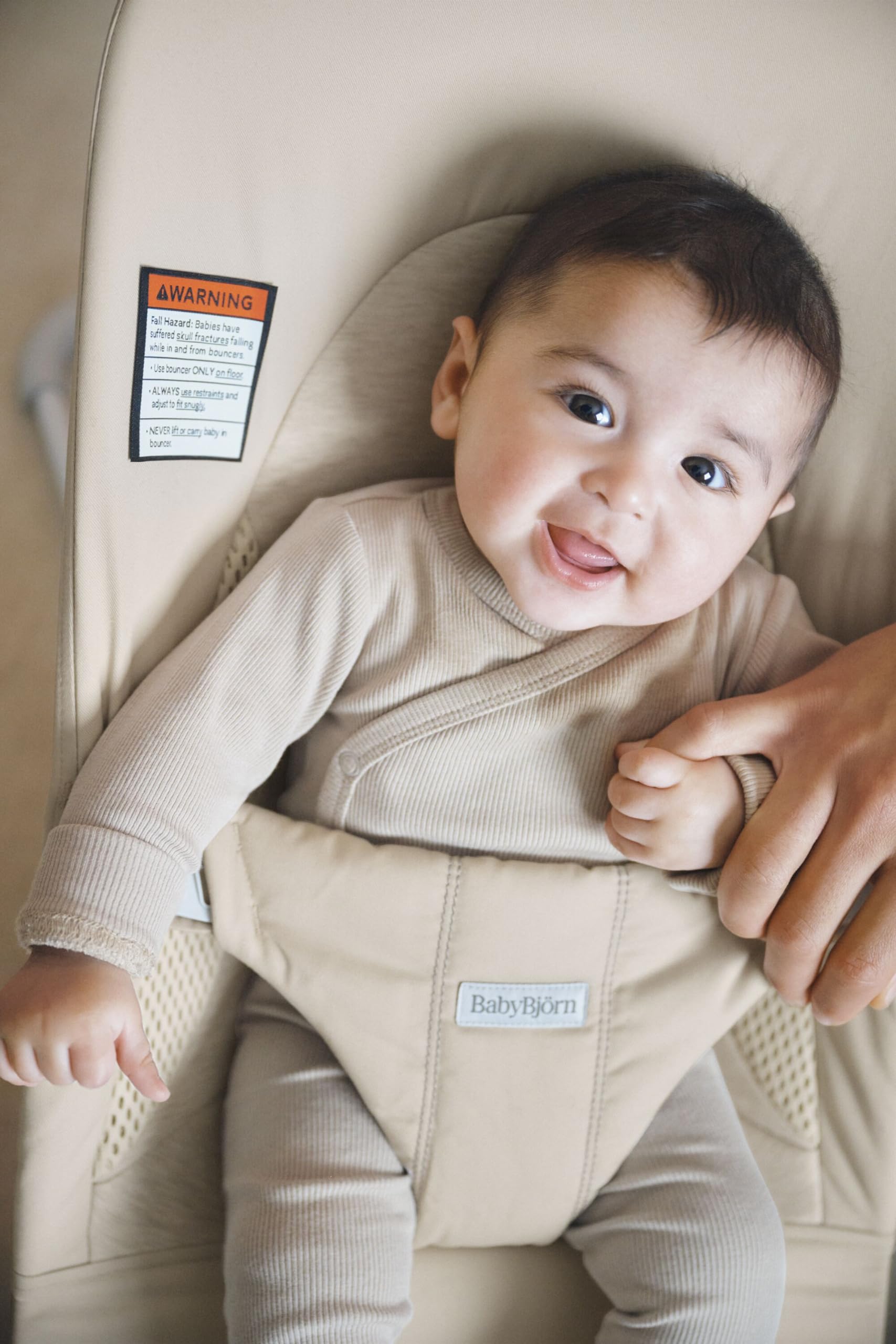 BabyBjörn Bouncer Balance Soft light beige fabric texture ideal for cozy baby lounging.