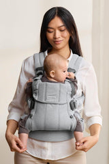 BabyBjörn Harmony back support demonstrates ergonomic posture while wearing