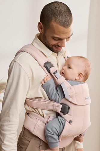 BabyBjörn Harmony ergonomic waist belt supports wearer with pressure relief.